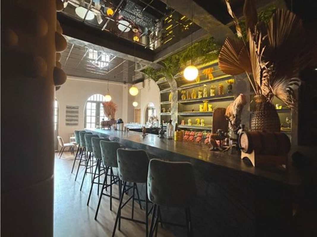 Stylish cocktail bar lounge interior in Casco Viejo commercial colonial building