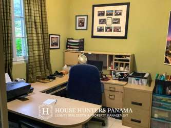Cozy home office with window and desk space in residential house Portobelo Panama