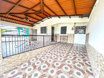 Living room with ceiling fan tiled floors in Villas del Carmen Panama