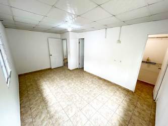 Living space tiled floor connected to hallways in Villas del Carmen Panama