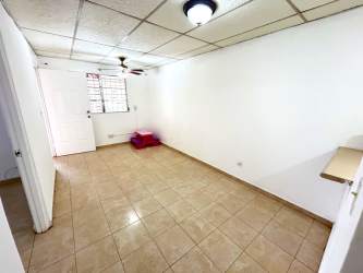 Covered outdoor terrace with tile flooring in Villas del Carmen La Chorrera Panama