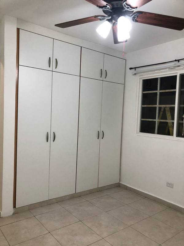 Bedroom with closet, ceiling fan, and tiled floor Villas del Golf Brisas del Golf Panama