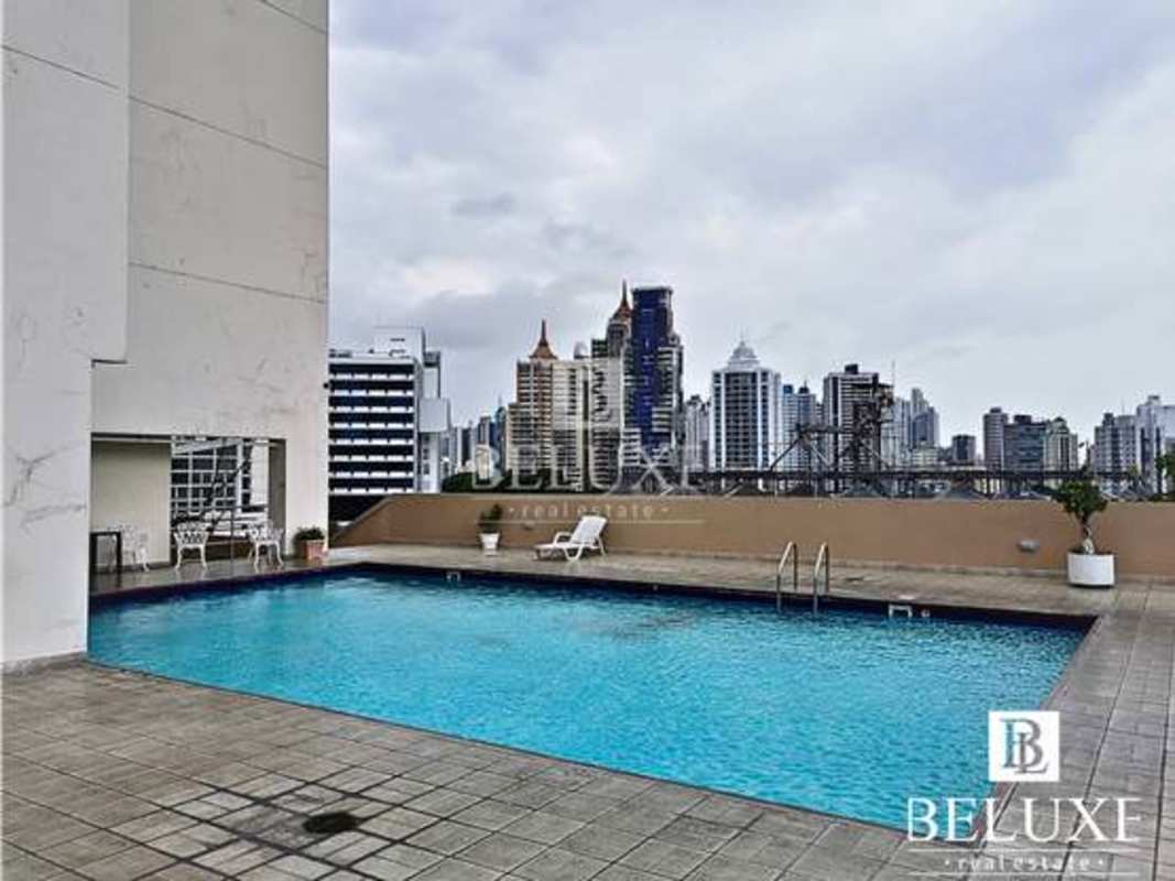 Swimming pool with sun deck rooftop view in PH Majestic Garden Edison Park Panama