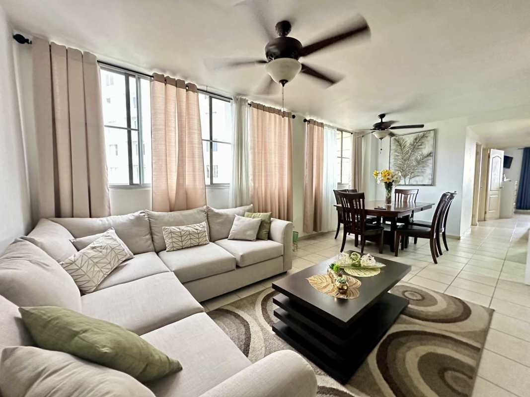 Closed kitchen with granite countertops, white cabinetry, appliances at PH Mallorca Park Milla 8 Panama