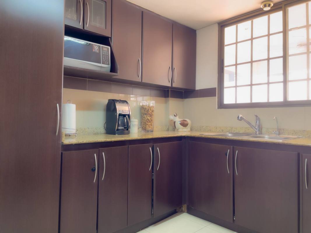 Spacious living and dining area with natural light, terrace access Panama House for sale