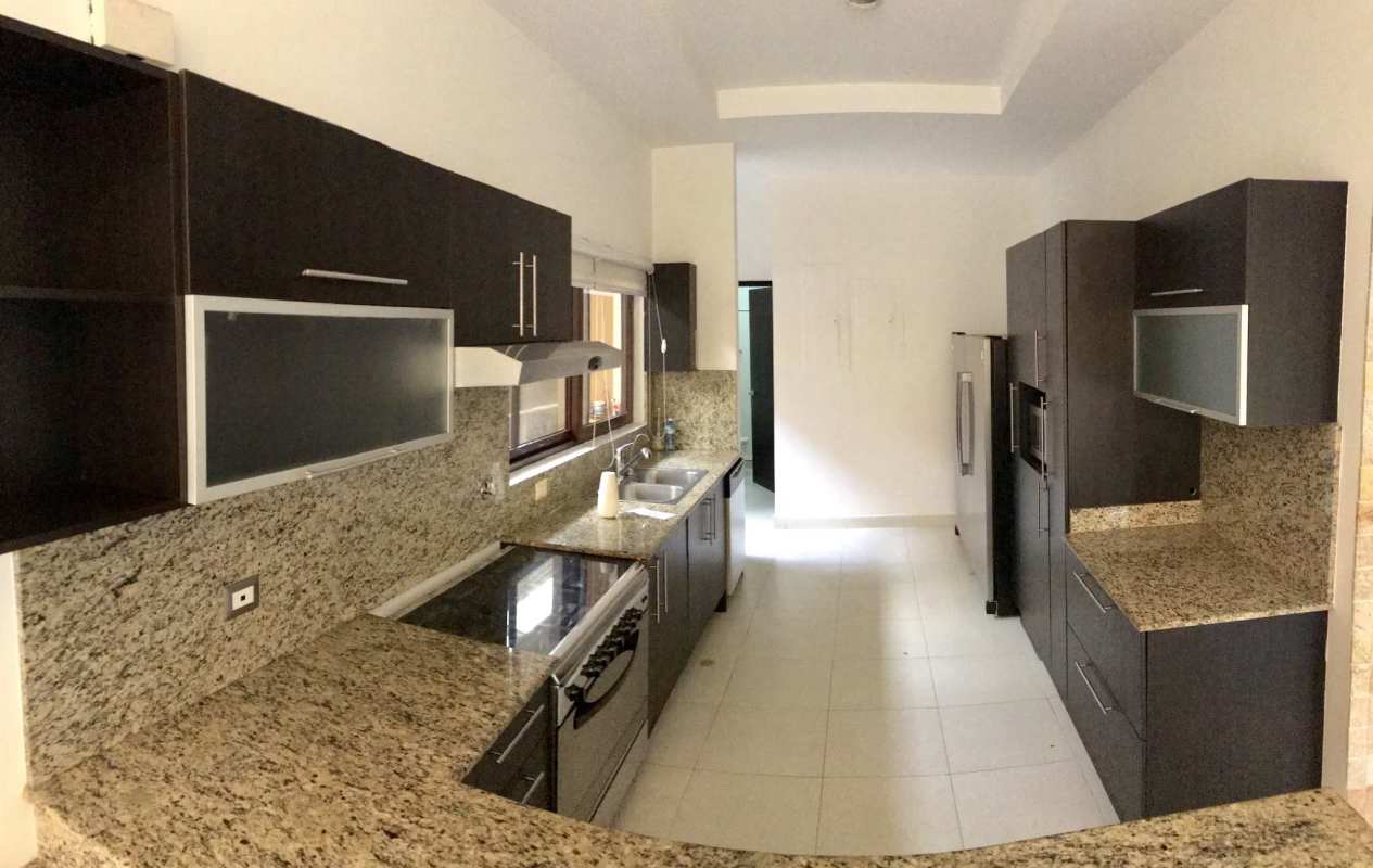 Bright dining room with large windows in luxury home Sunset Coast Costa Sur Panama City