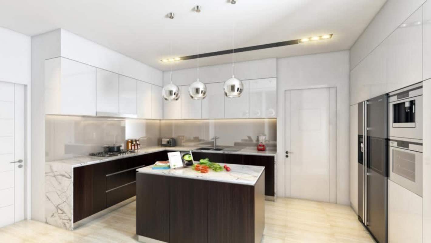 Modern kitchen with marble countertops and appliances at PH Luxor 400 Panama