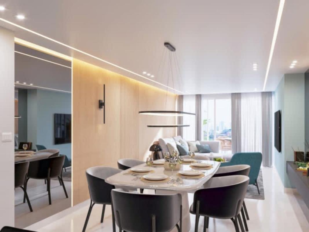 Open modern living dining room with large windows in Luxor 400 Panama City