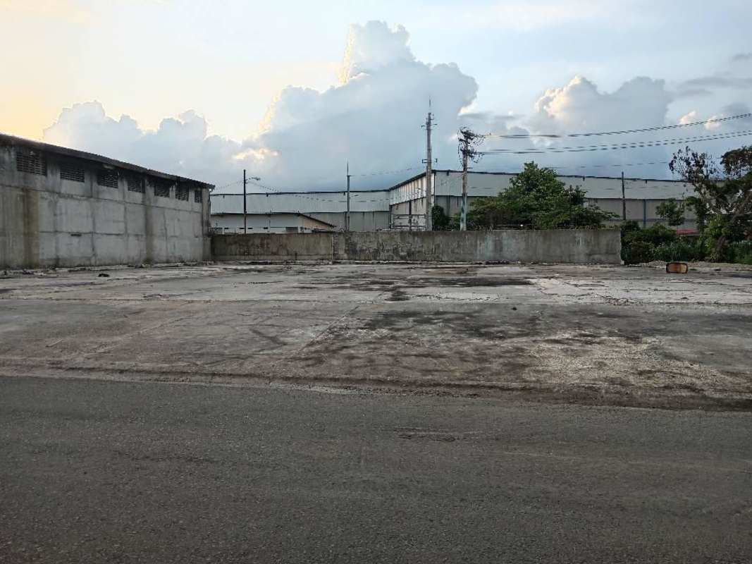 Multi-story gated building with balconies on commercial compound in Río Abajo Panama City