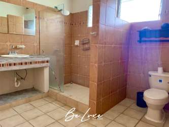 Bedroom in Costa Esmeralda beach house with bunk beds, split air conditioning and large windows