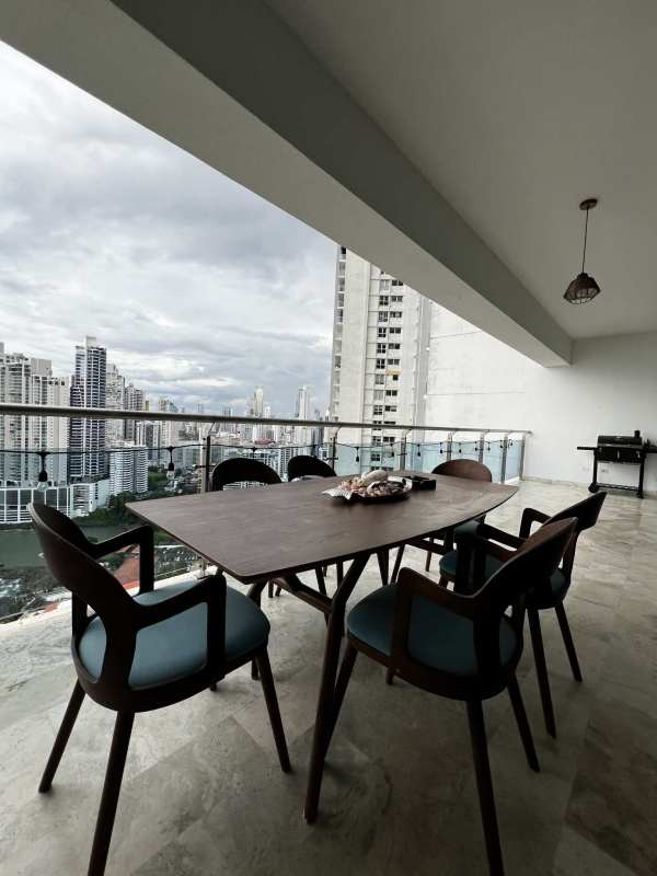 Bedroom with floor-to-ceiling windows, city and ocean vistas, marble floor, in PH Aqualina Punta Pacifica