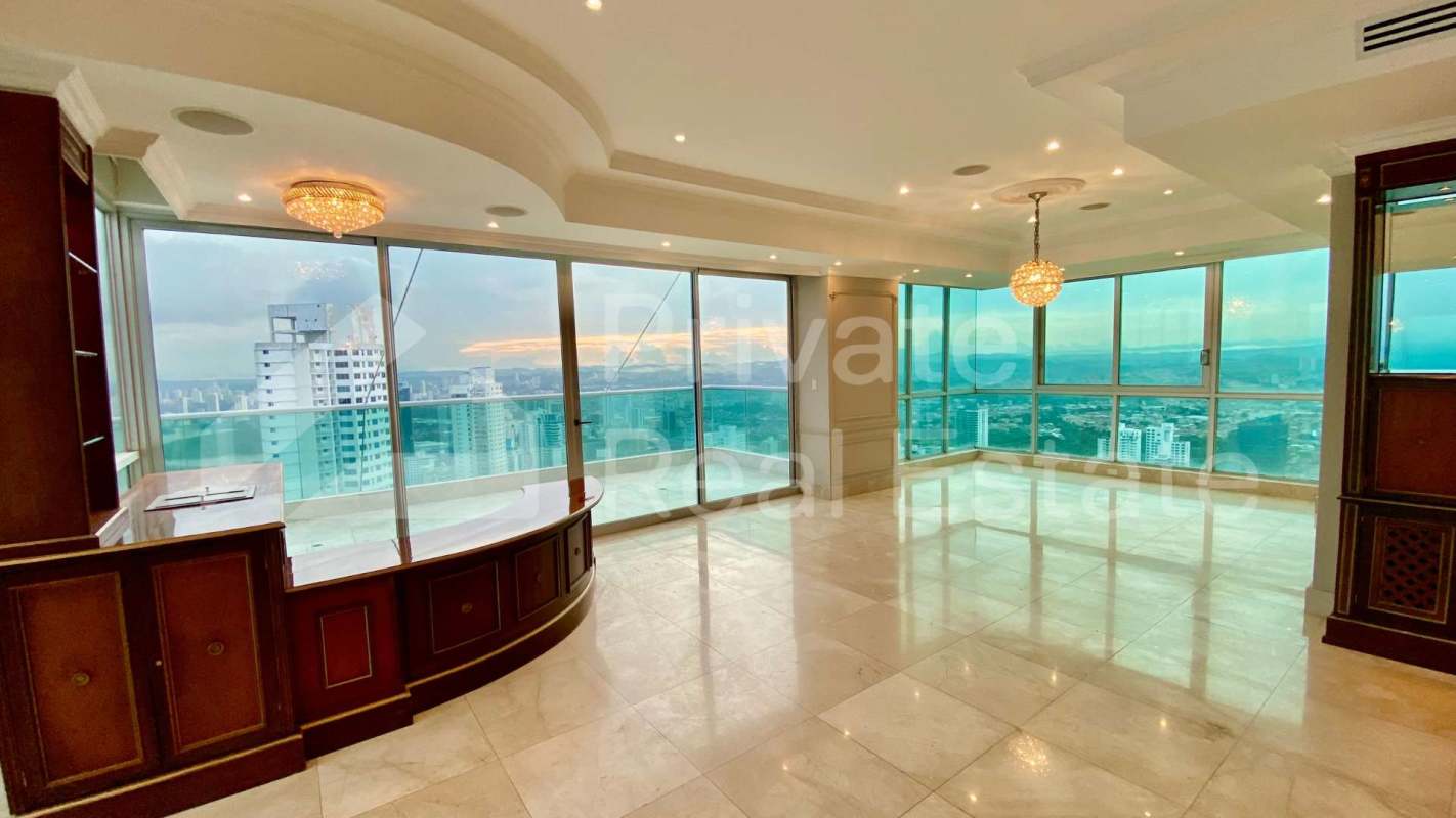 Gourmet kitchen with center island, granite counters, stainless appliances overlooking ocean views at PH Ocean Two Costa del Este Panama