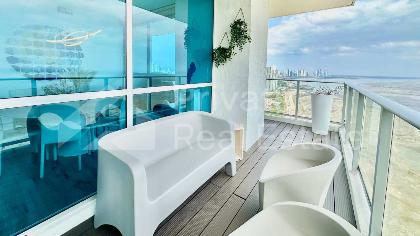 Open kitchen with granite countertops and modern appliances in PH Oceanaire Panama