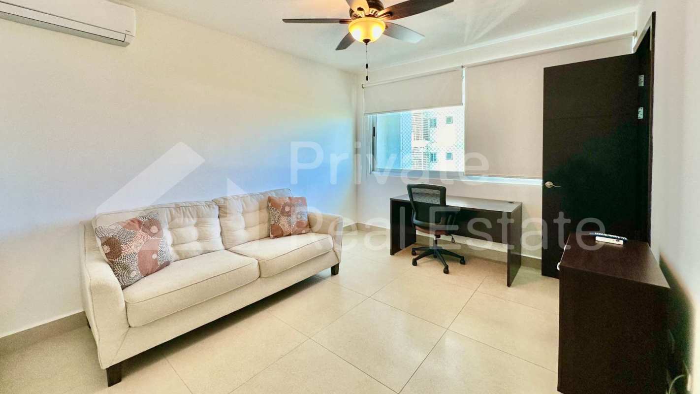 Spacious kitchen with granite countertops, stainless steel appliances, wood cabinets PH Titanium Costa del Este Panama