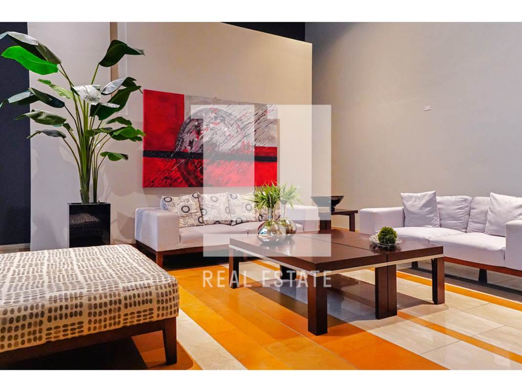 Spacious master bedroom with large windows and city views PH Portanova El Cangrejo