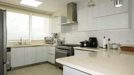 Spacious master bedroom with terrace access, en-suite bath in Punta Barco Village