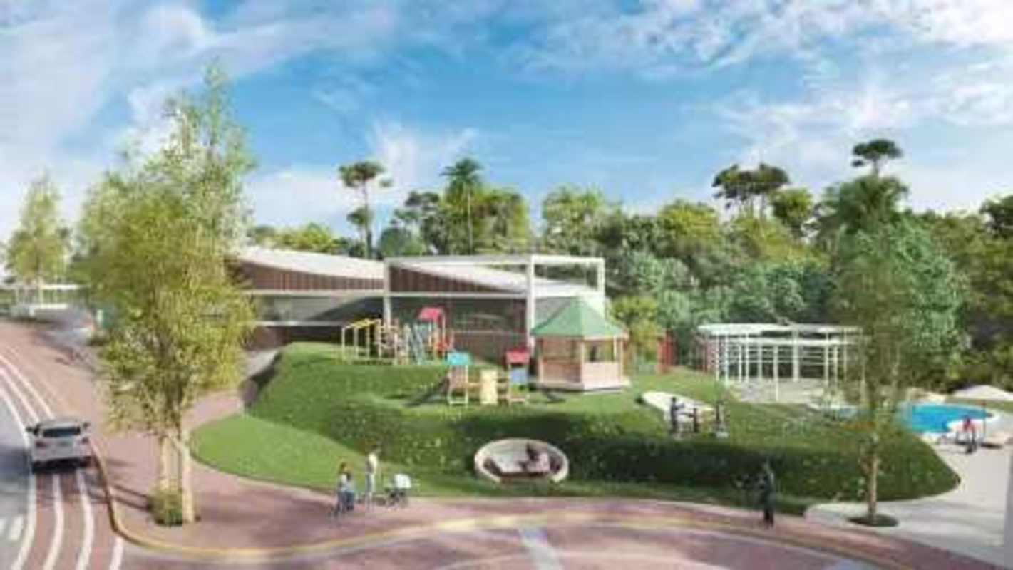 Green residential complex amid hills with roads and nature in Panama