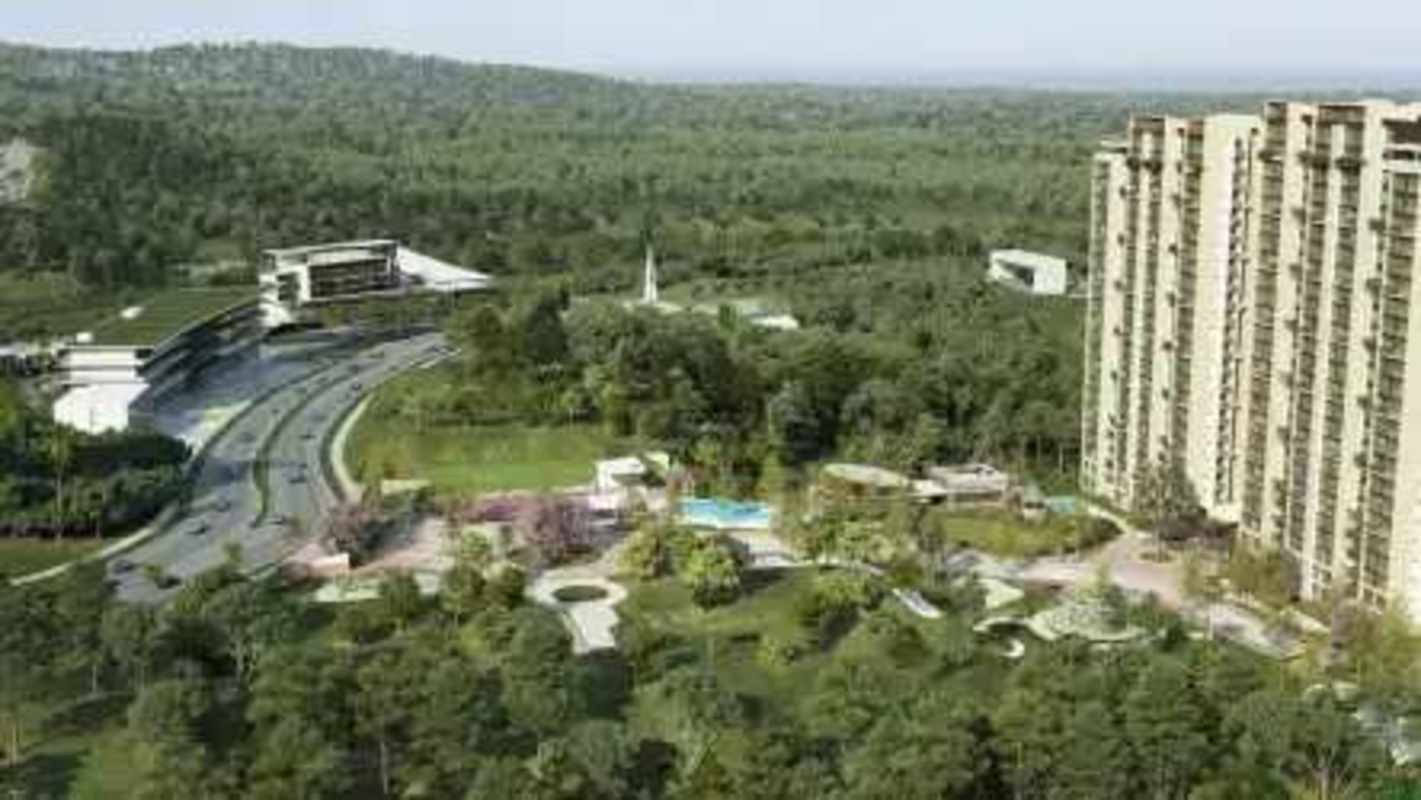 Play area and pool surrounded by gardens at Panorama 360 Green City Panama