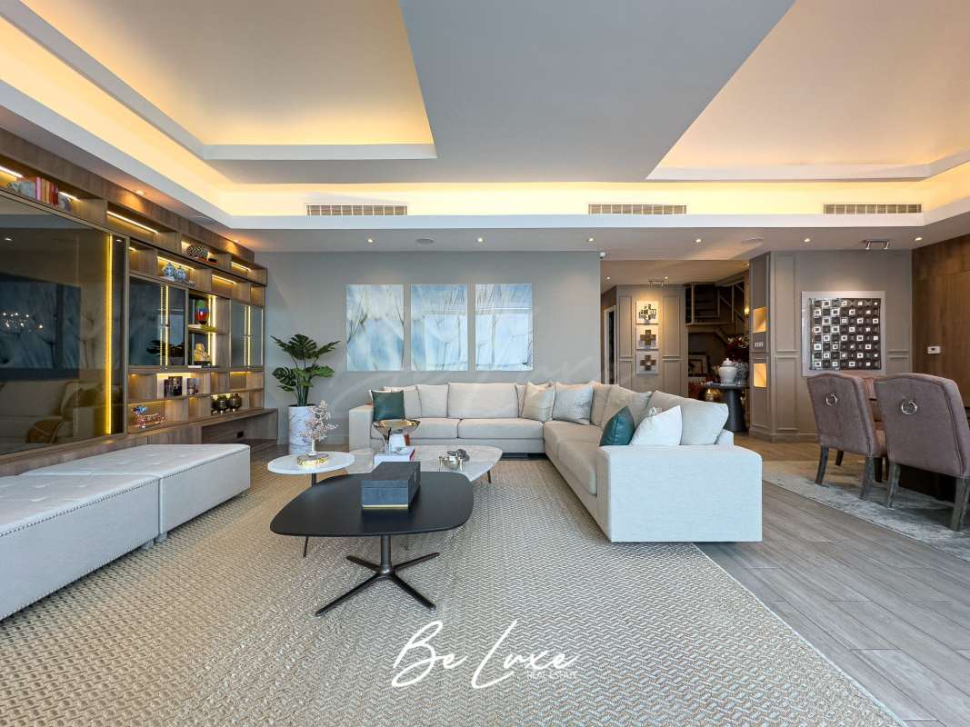 Modern spacious living area with custom shelving and recessed lighting in Pearl Tower Panama