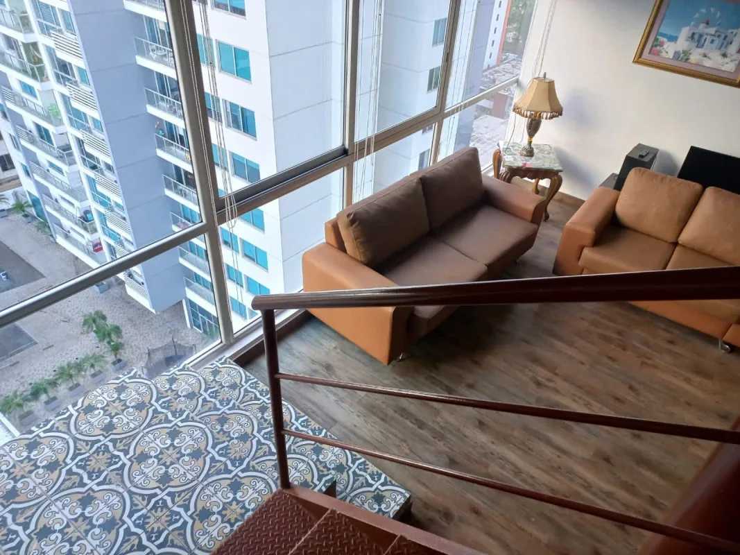 Floor-to-ceiling windows with city skyline views in PH Vitro Loft El Cangrejo loft apartment Panama City
