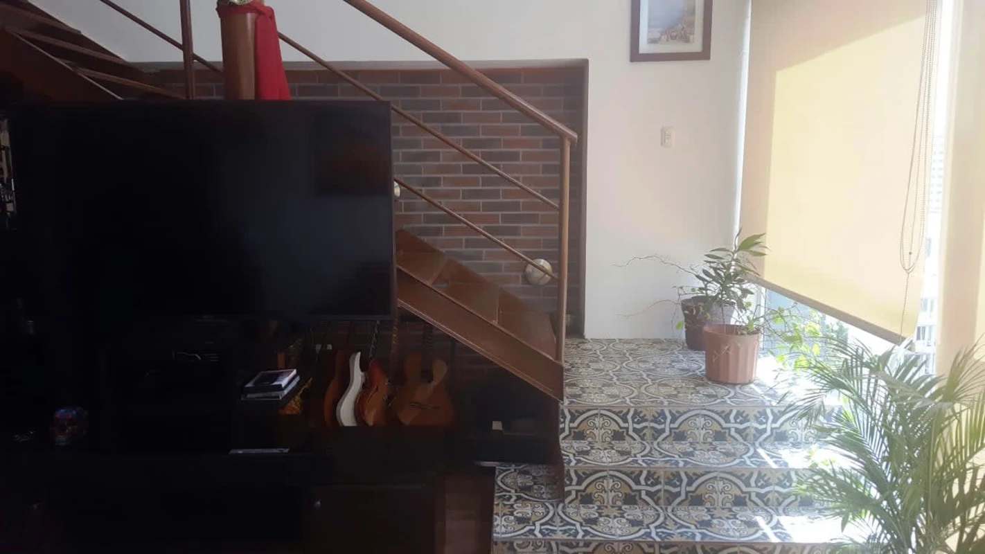 Mezzanine level bedroom featuring city views inside PH Vitro Loft El Cangrejo Panama City