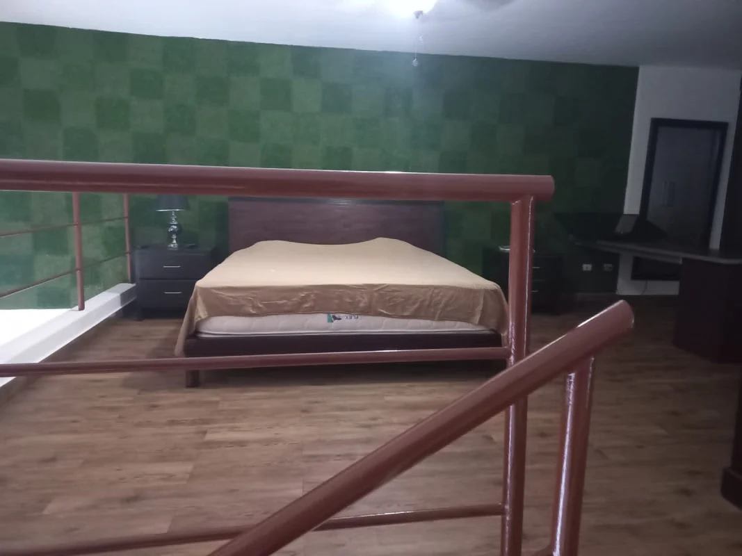 Stylish bathroom with granite countertop and modern fixtures in PH Vitro Loft Panama City