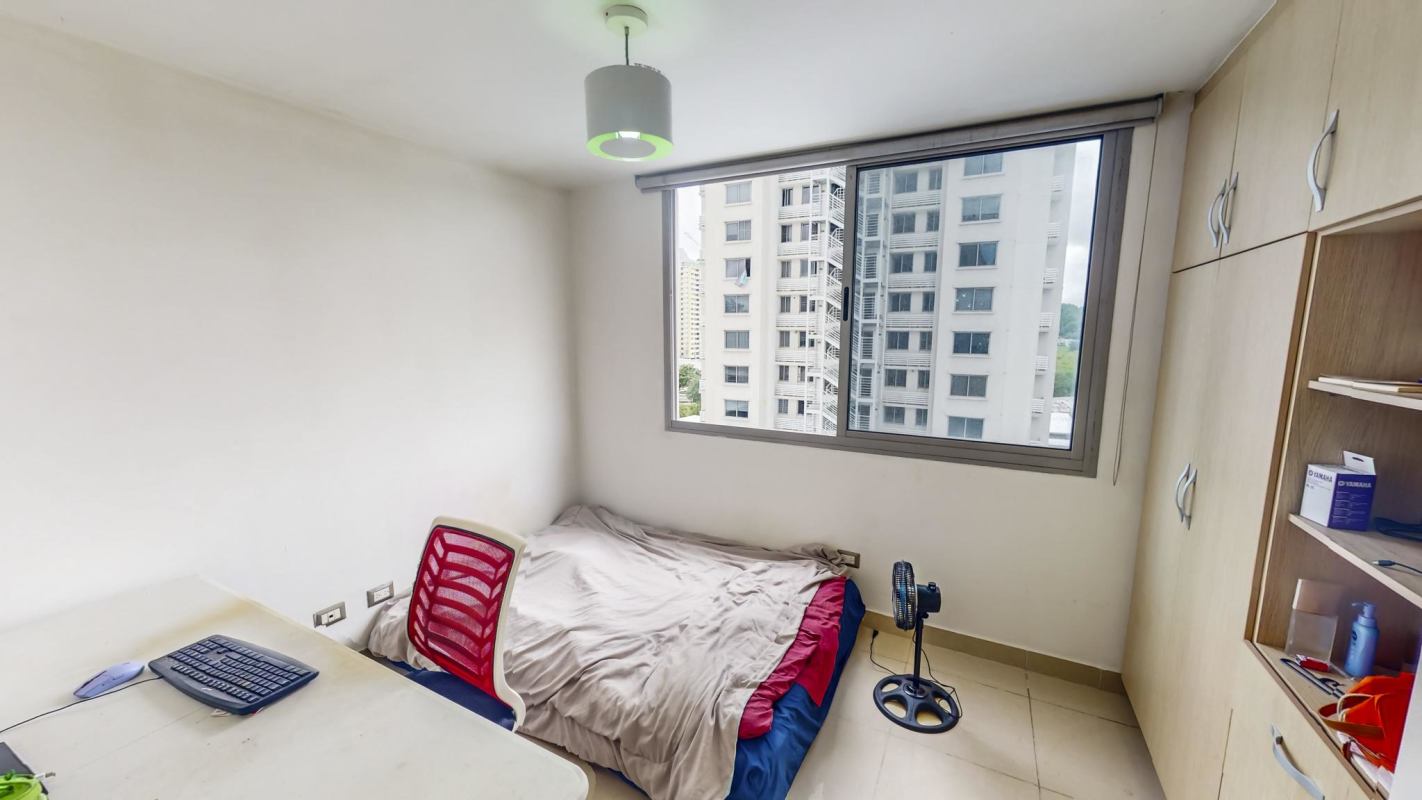 Balcony with glass railing overlooking mountains at PH Rokas Panama City