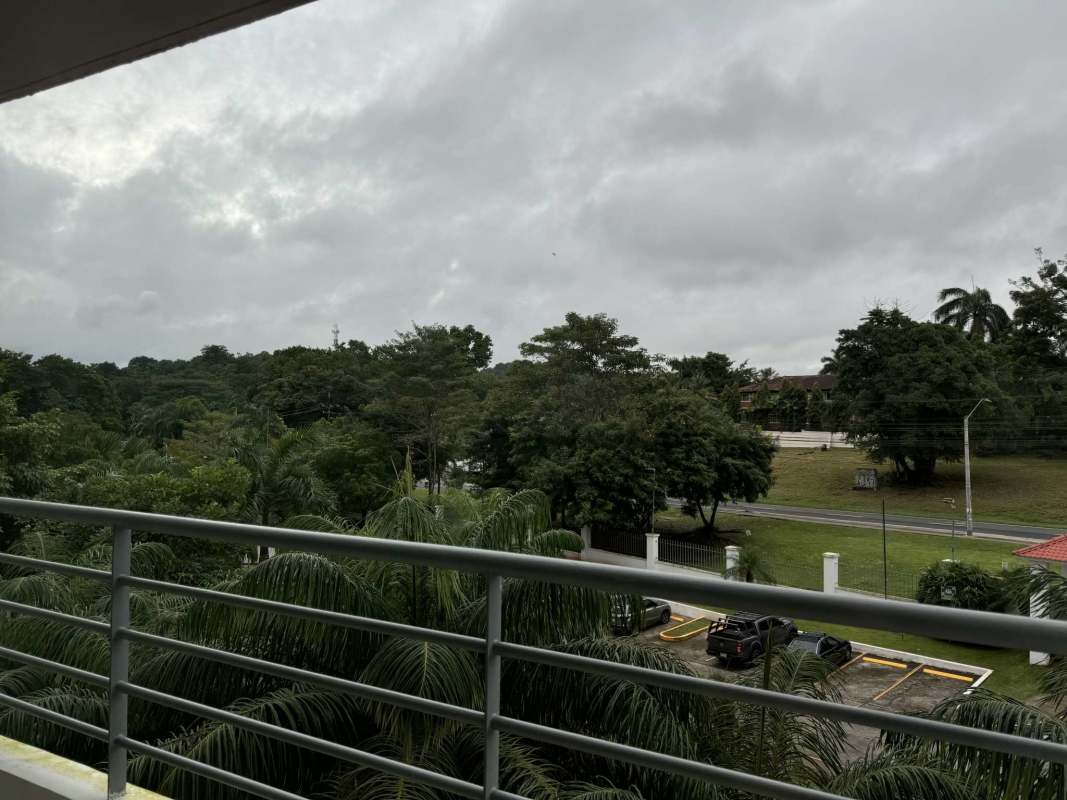 Balcony overlooking greenery and parking in PH Clayton Park Clayton Panama