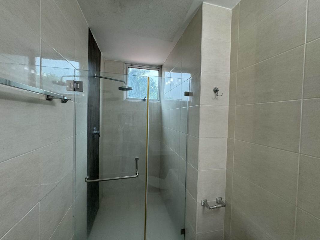 Glass enclosed shower area tiled modern bathroom PH Clayton Clayton Park