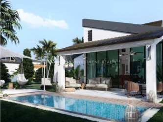 Central landscaped garden with water feature and surrounding contemporary homes in Terra Viva Coronado