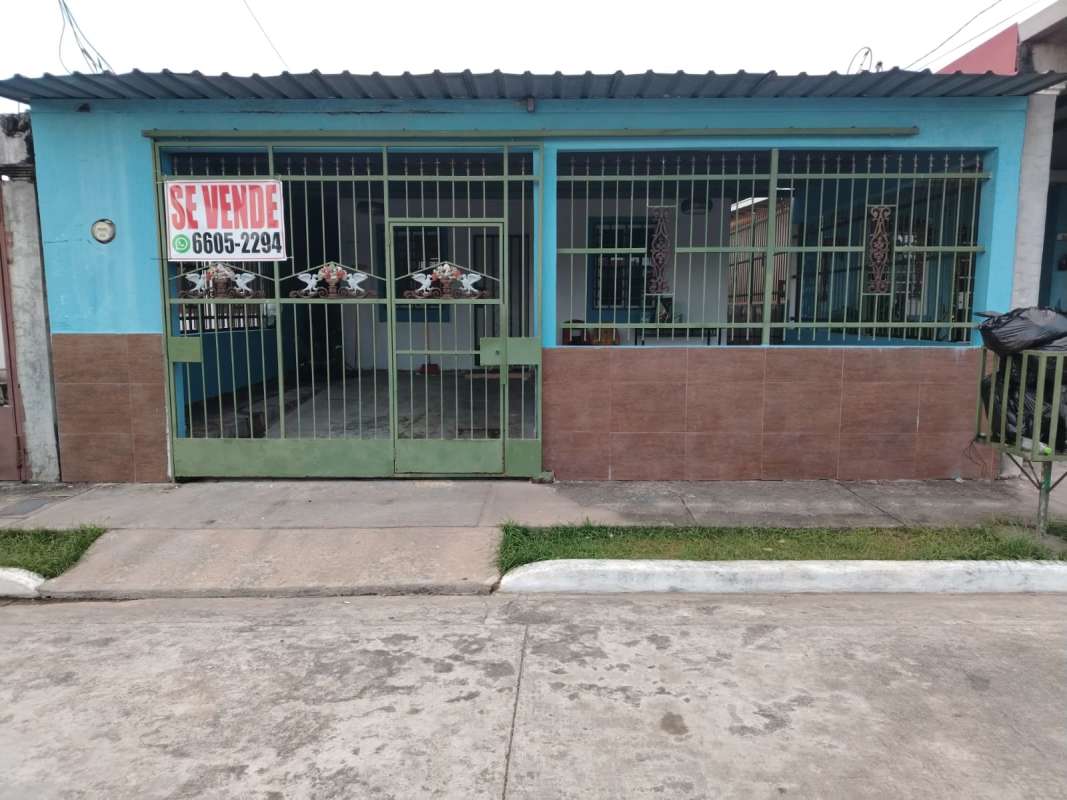 Covered front entrance and tiled patio Tocumen house Panama City