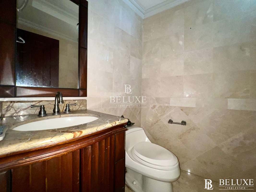 Empty minimalist bedroom with large window overlooking ocean PH Princesa Condesa Panama