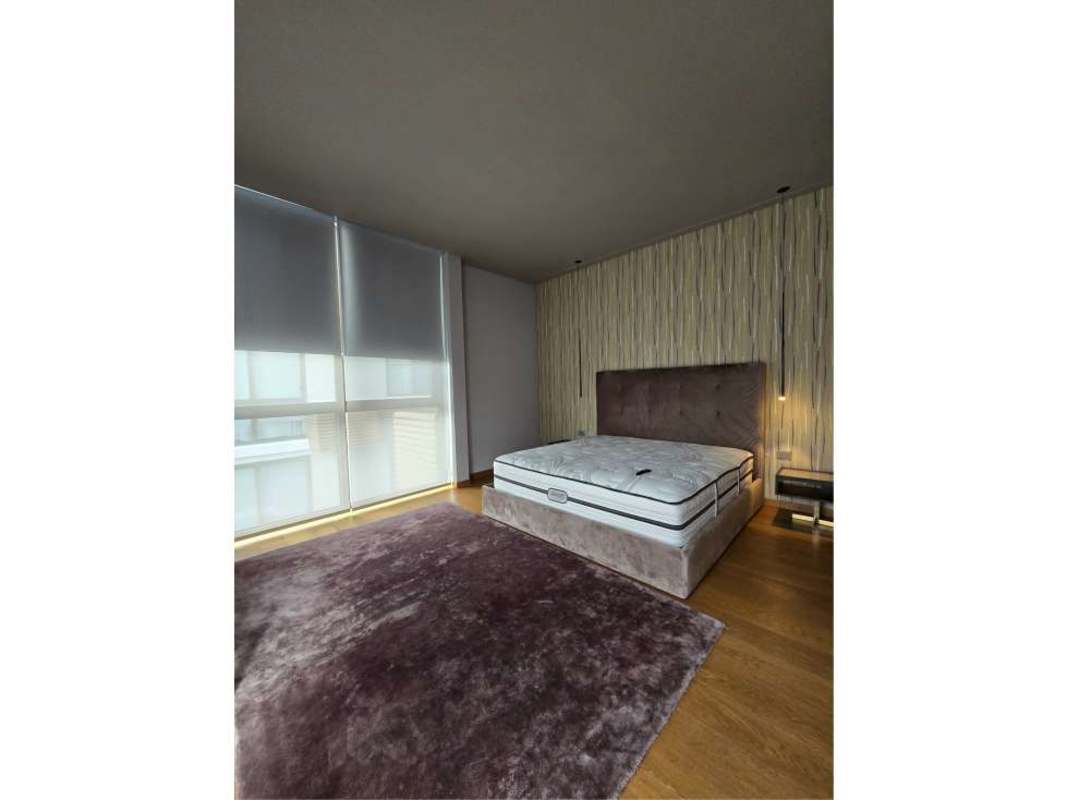 Open concept luxury kitchen with marble island, integrated appliances, ocean view Garden Apartments Ocean Reef