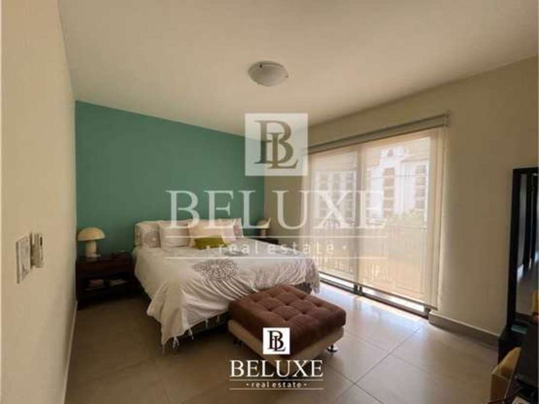 Balcony with views of gardens and pool at Embassy Village Clayton Panama