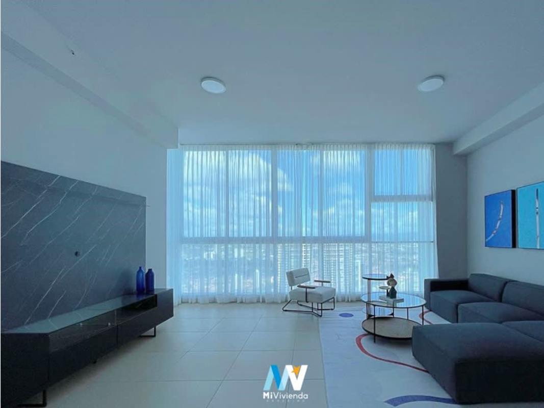 Private cinema room with large projection screen and tiered seating in Costa del Este condo PH Country Club