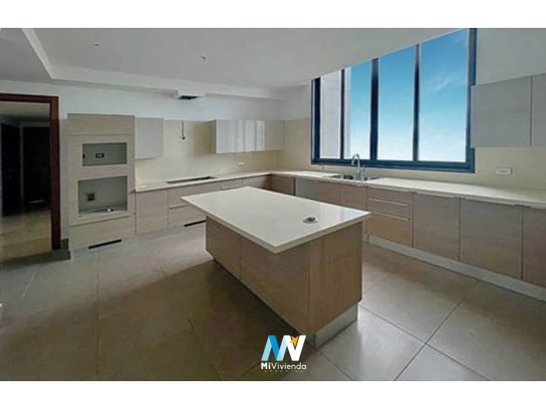 Luxury modern kitchen with island and large windows at PH Valery Point Santa Maria Golf Panama