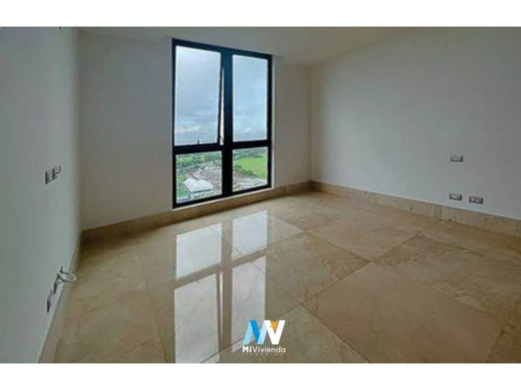 Modern bedroom with large window offering golf view in luxury apartment Santa Maria Panama