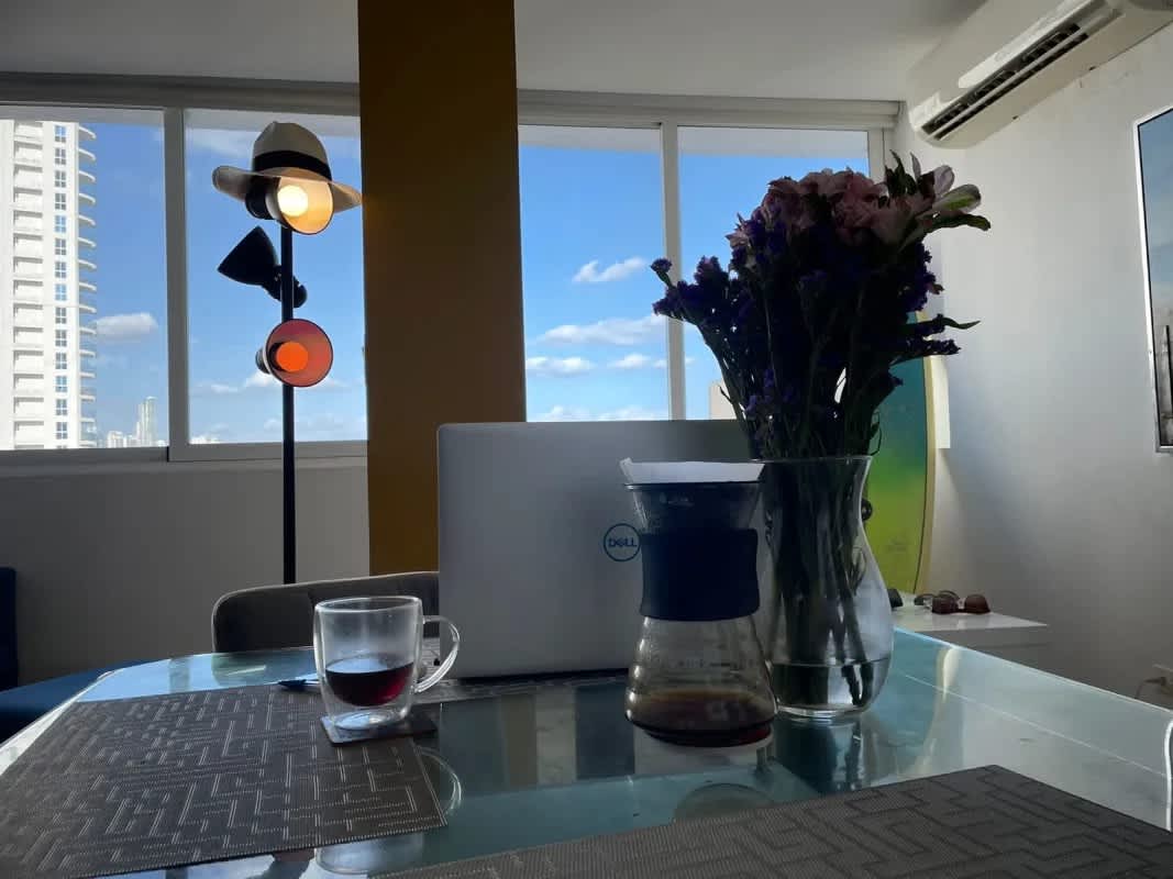 Open dining or office space with panoramic city skyline views Bay View Tower Panama