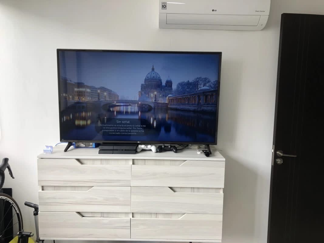 Glass enclosed balcony overlooking Panama skyline PH Sky Park Vía España
