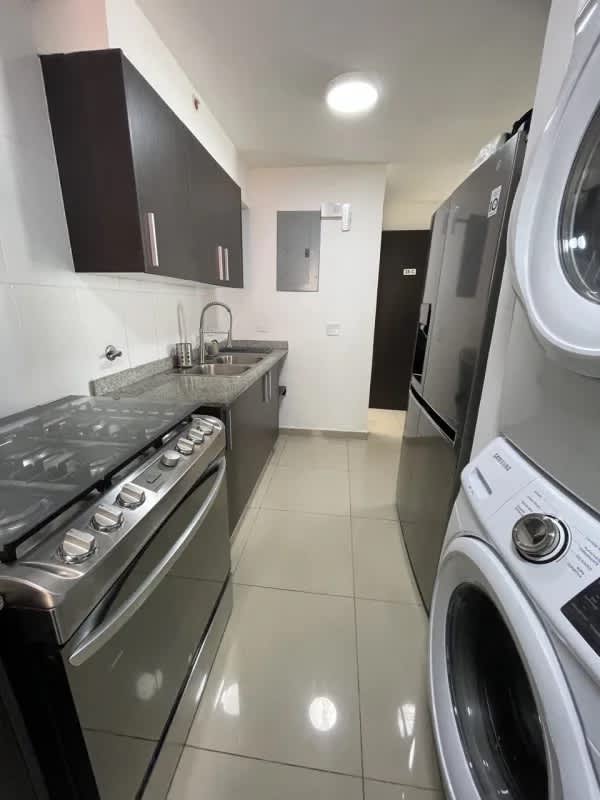 Bedroom with large window, blackout shades, closet and air conditioning in PH Sky Park Panama