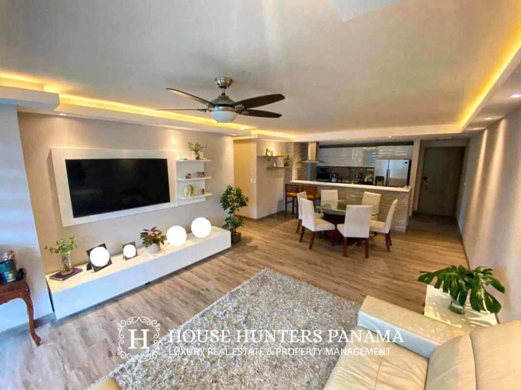 Modern bathroom with mosaic tiled shower and floating vanity in PH Sunrise Tower Obarrio Panama