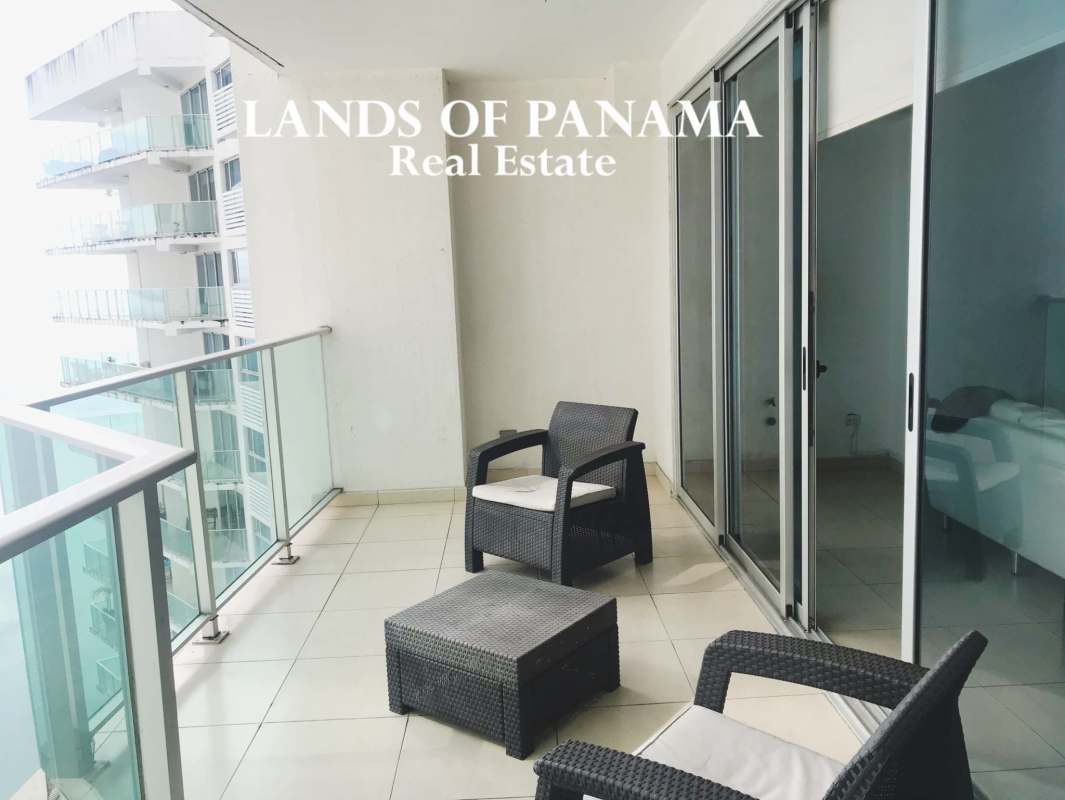 Balcony with glass railing and panoramic Pacific Ocean views in PH Oasis Punta Pacifica Panama City