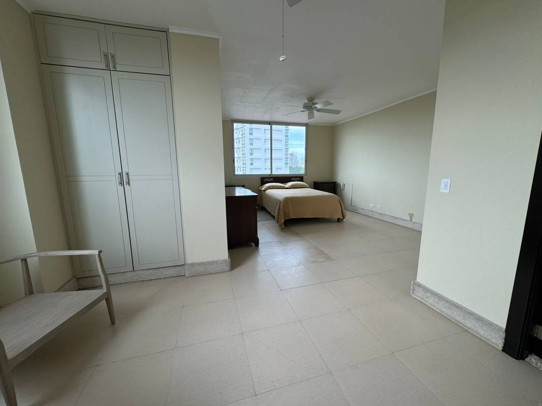 Large bright bedroom with city view and modern closet PH Park One Altos del Golf Panama City