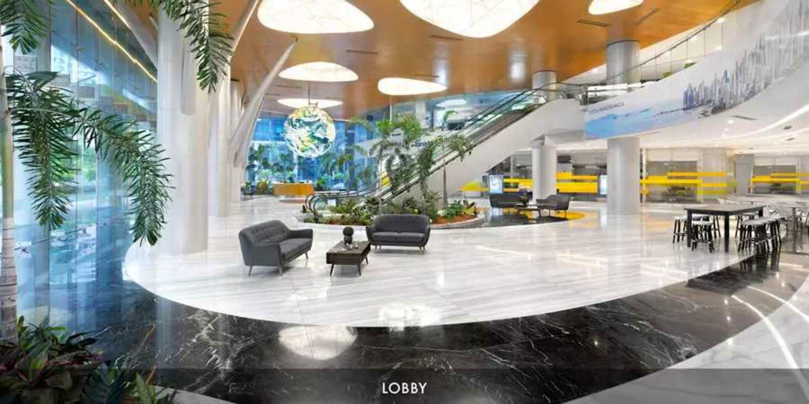 Waiting and reception area with skyline views glass wall inside PH Financial Park Costa del Este