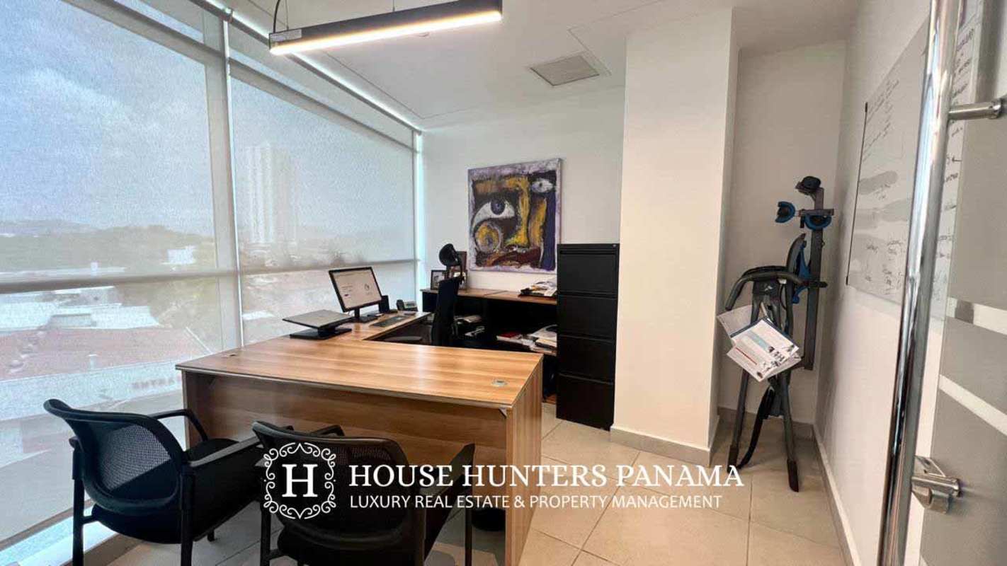 Glass-enclosed modern conference room with meeting table at El Dorado Tower business center Panama