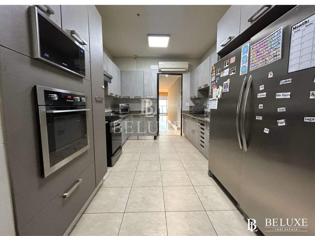 Luxurious master bedroom with sea views, walk-in closet, en-suite bath, terrace access in PH Pacific Village Punta Pacifica