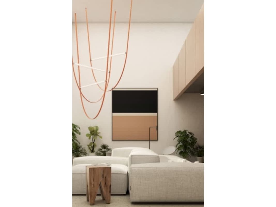 Compact open kitchen with cabinetry, cooktop, dining for two in PH Nook Bella Vista