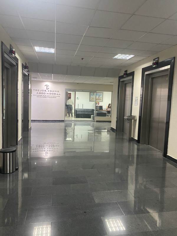 Lobby area with elevators inside Torre Banesco high-rise office Panama