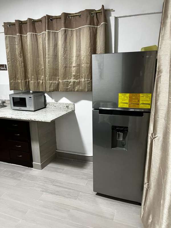 Open studio apartment furnished with king bed sofa bed Villa de las Fuentes Panama