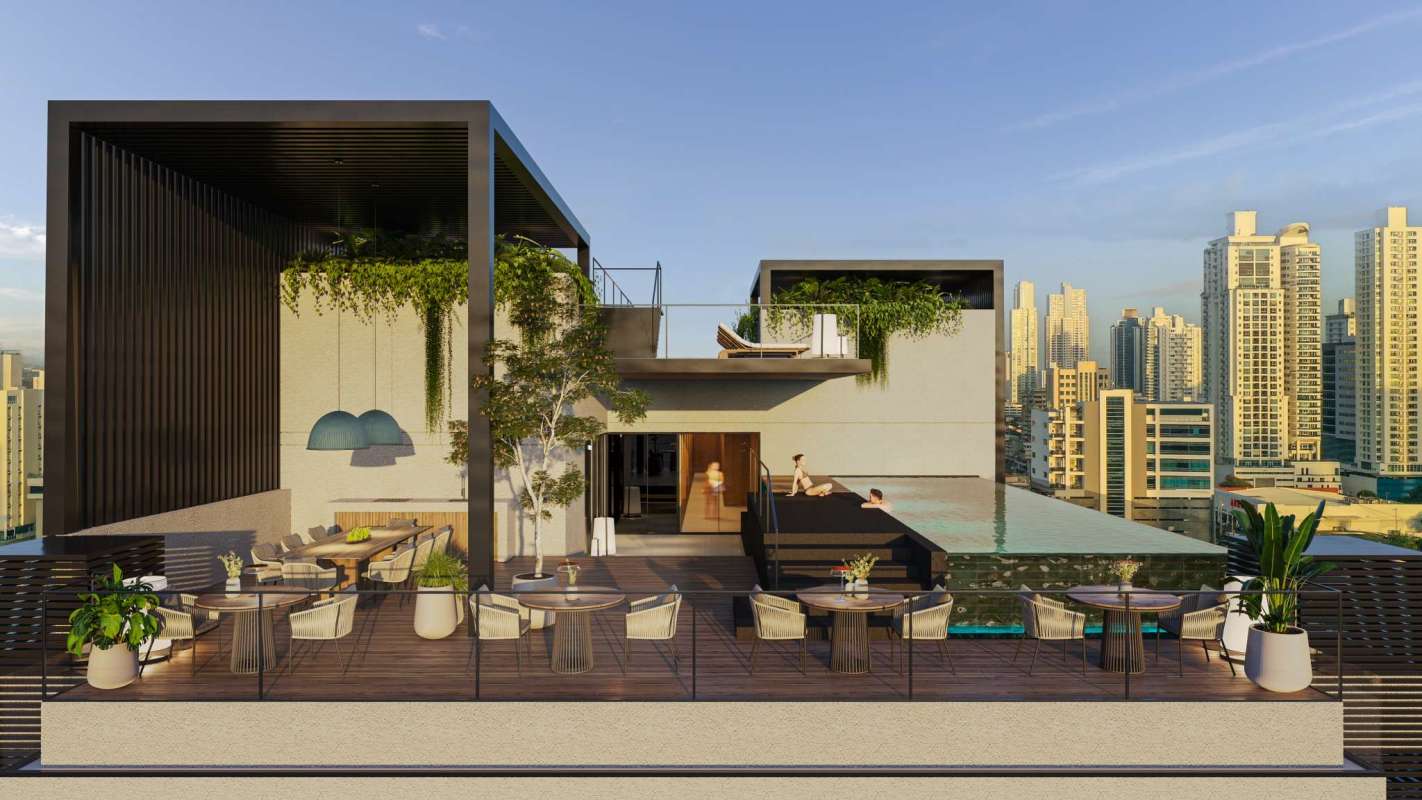 Rooftop terrace with yoga zone, greenery, sunset city skyline view in PH BELIVING Panama